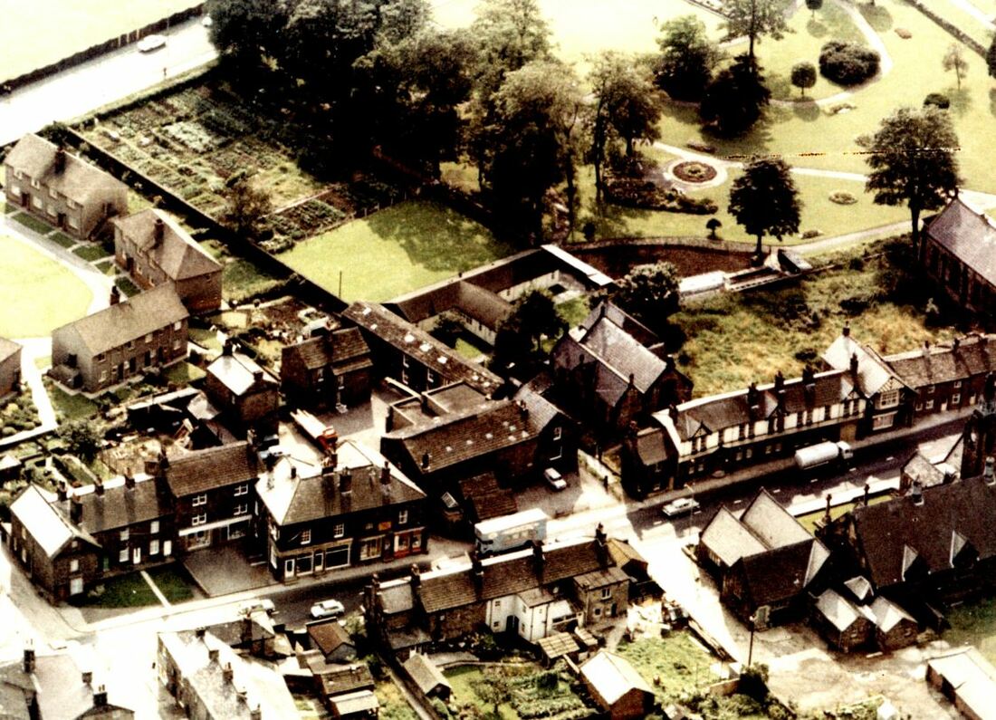 1960s Oblique aerial image Main Street and its environs, Burley in Wharfedale.