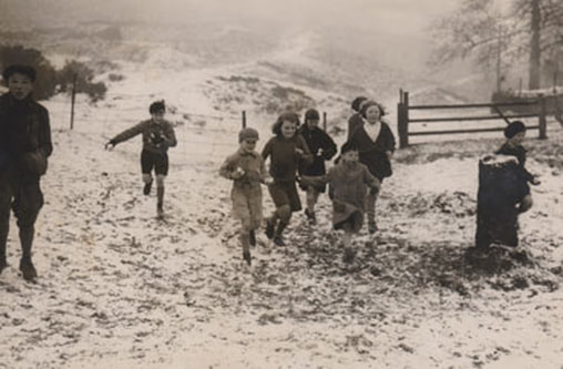1946 Jan - Burley Woodhead School pupils coming down from Burley Moor.
