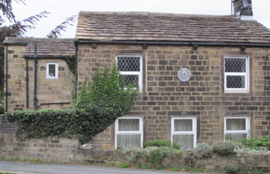 3 Sun Dial on house North Parade & Main St., Burley in Wharfedale.