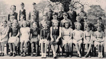 1947 Burley National School with Miss Oxley. Aireville Terrace, Burley in Wharfedale.