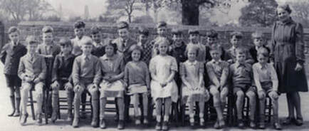 1947 Burley National School with Mrs Gale. Aireville Terrace, Burley in Wharfedale.