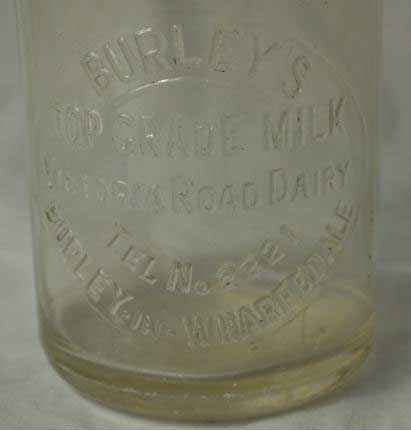 Victoria Road Dairy - milk bottle closeup.  Burley in Wharfedale.